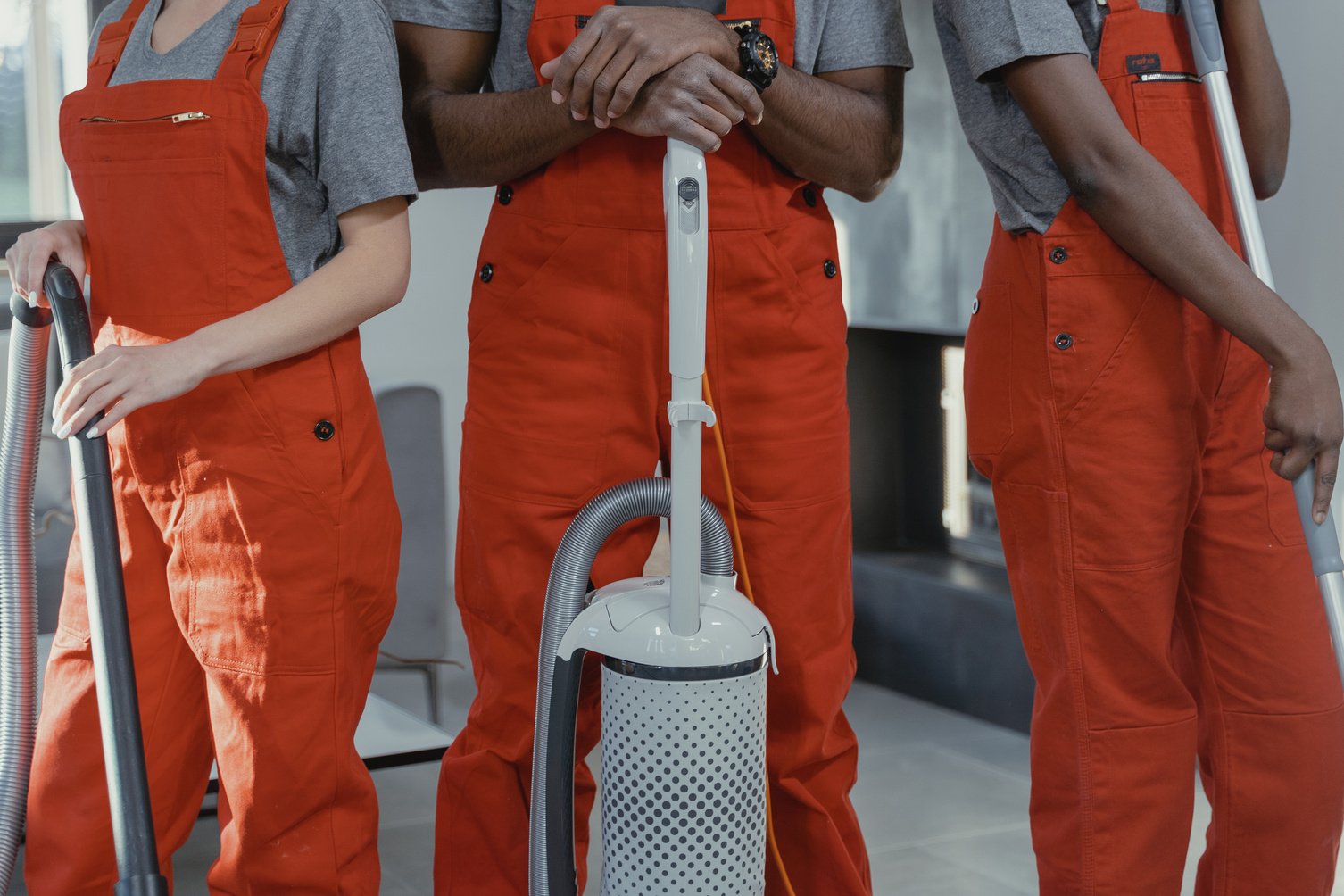 People Wearing Orange Coveralls